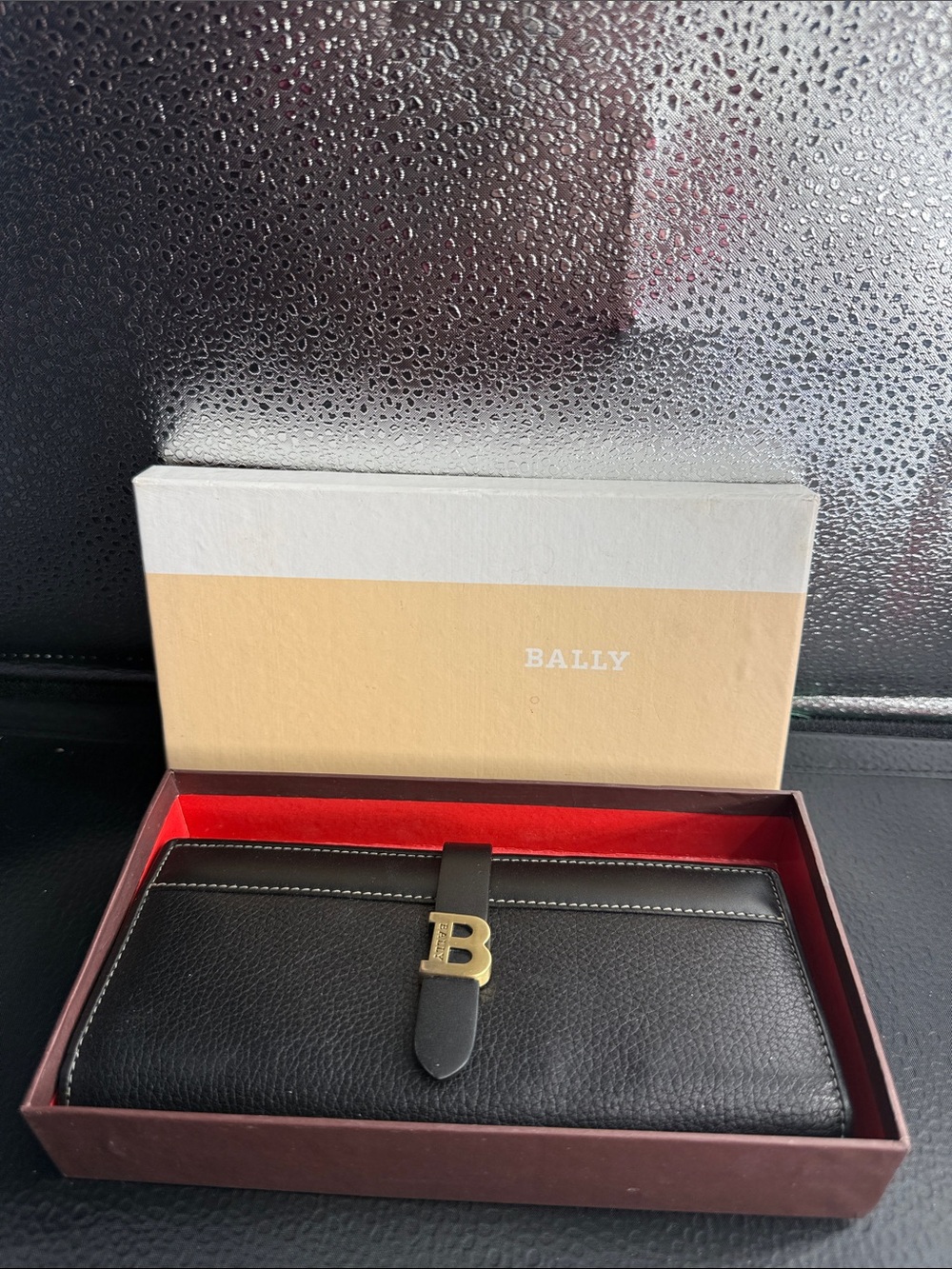 Bally Black Leather Wallet with Gold B Accent